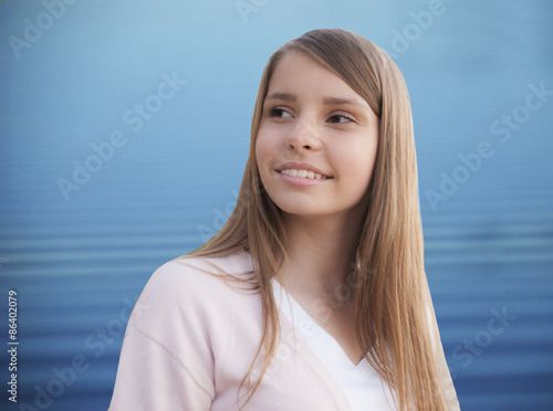 Portrait of beautiful young girl, model with long hair