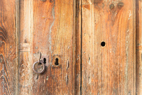 Old wooden door of an old house 