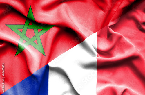 Waving flag of France and Morocco