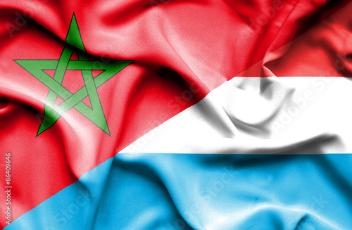 Waving flag of Luxembourg and Morocco