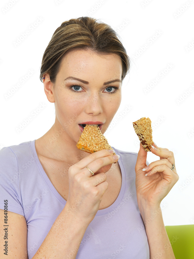 Attractive Young Woman Holding Slices of Sesame Toast Attractive Young Woman Holding Slices of Sesame Toast