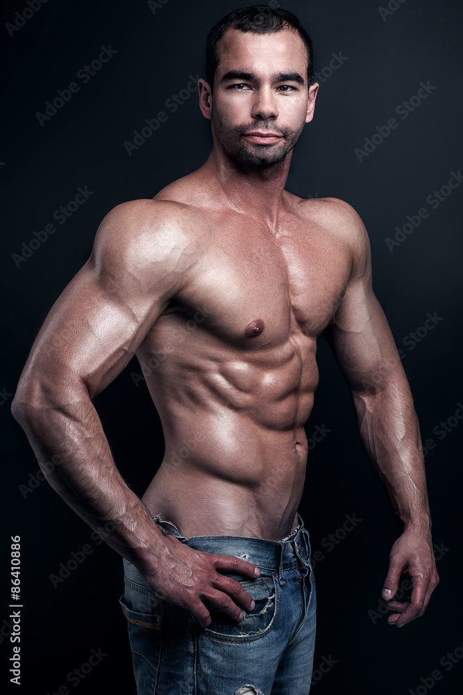 Fototapeta premium Handsome muscular man posing.