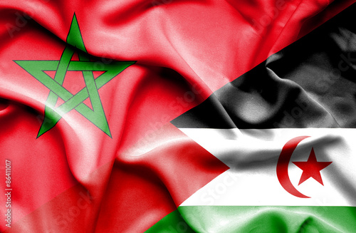 Waving flag of Western Sahara and Morocco