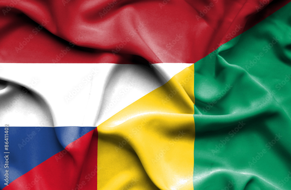 Waving flag of Guinea and Netherlands Waving flag of Guinea and Netherlands