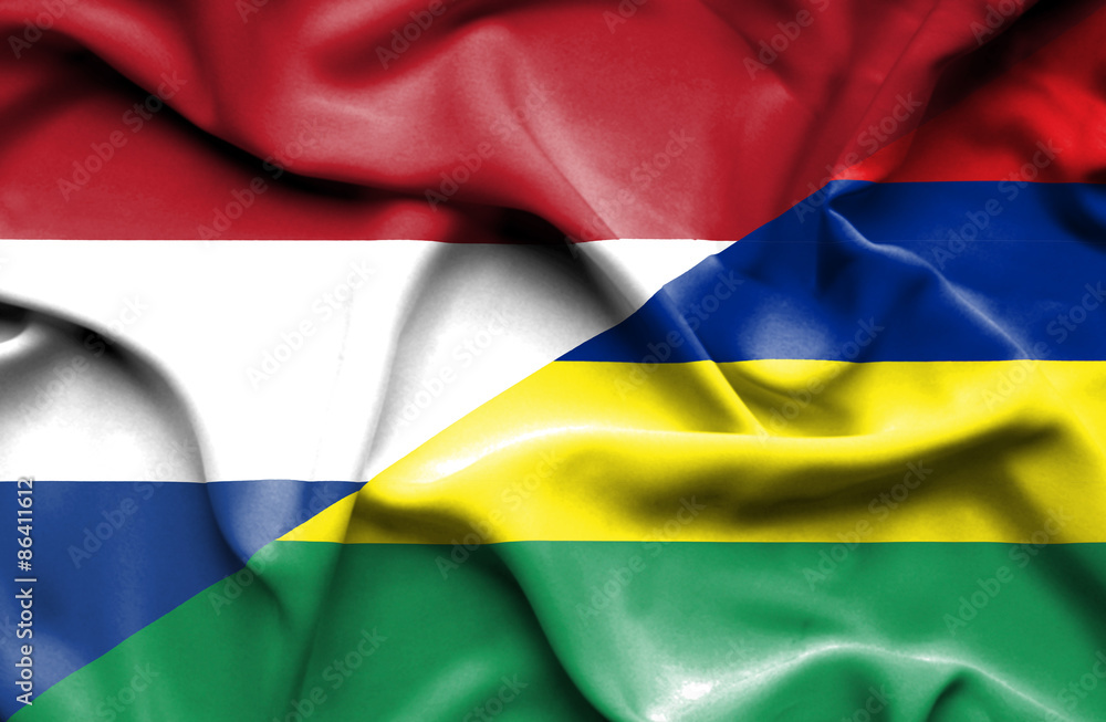Obraz premium Waving flag of Mauritius and Netherlands