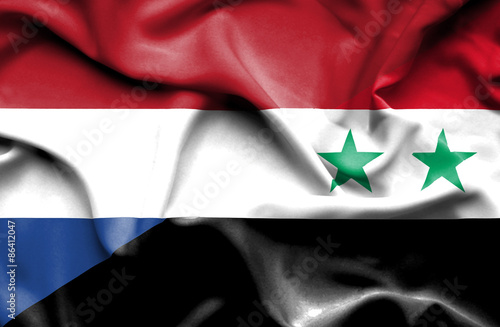 Waving flag of Syria and Netherlands