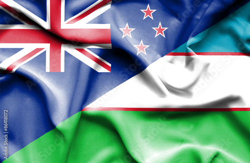 Waving flag of Uzbekistan and New Zealand photo