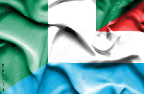 Waving flag of Luxembourg and Nigeria