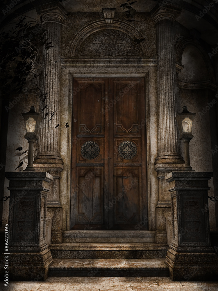 Drzwi do gotyckiej krypty z lampami nocą