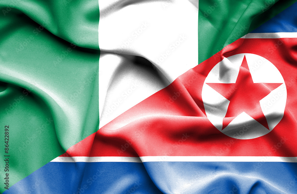 Waving flag of North Korea and Nigeria
