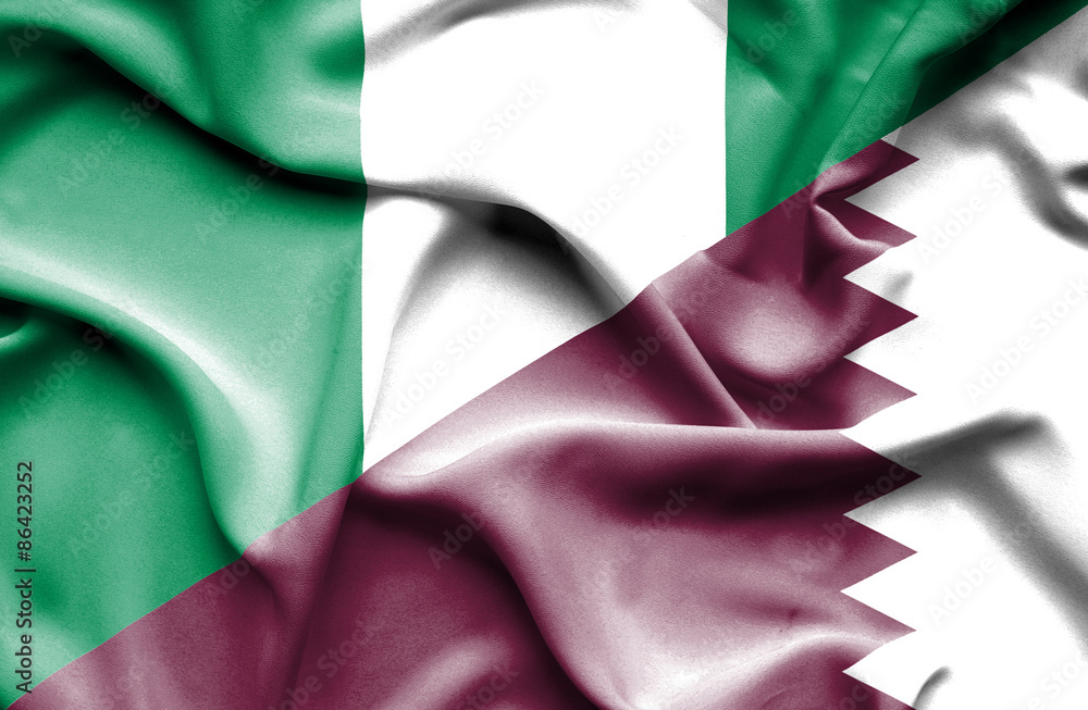 Obraz premium Waving flag of Qatar and Nigeria