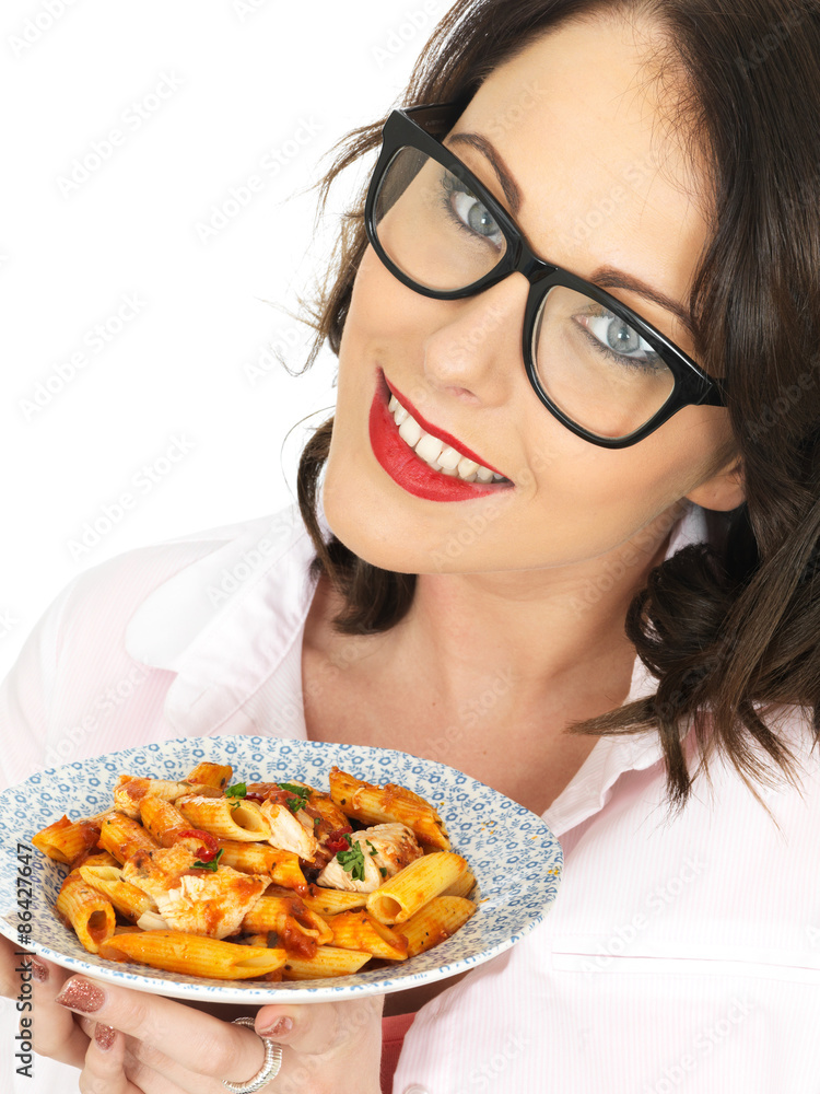 Young Woman Wearing Glasses Holding and Eating Penne Pasta Young Woman Wearing Glasses Holding and Eating Penne Pasta