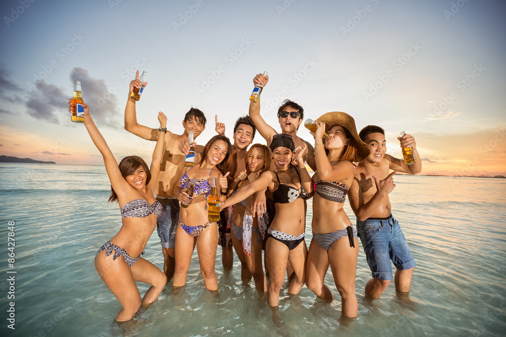 Group of friends having fun on summer beach Group of friends having fun on summer beach