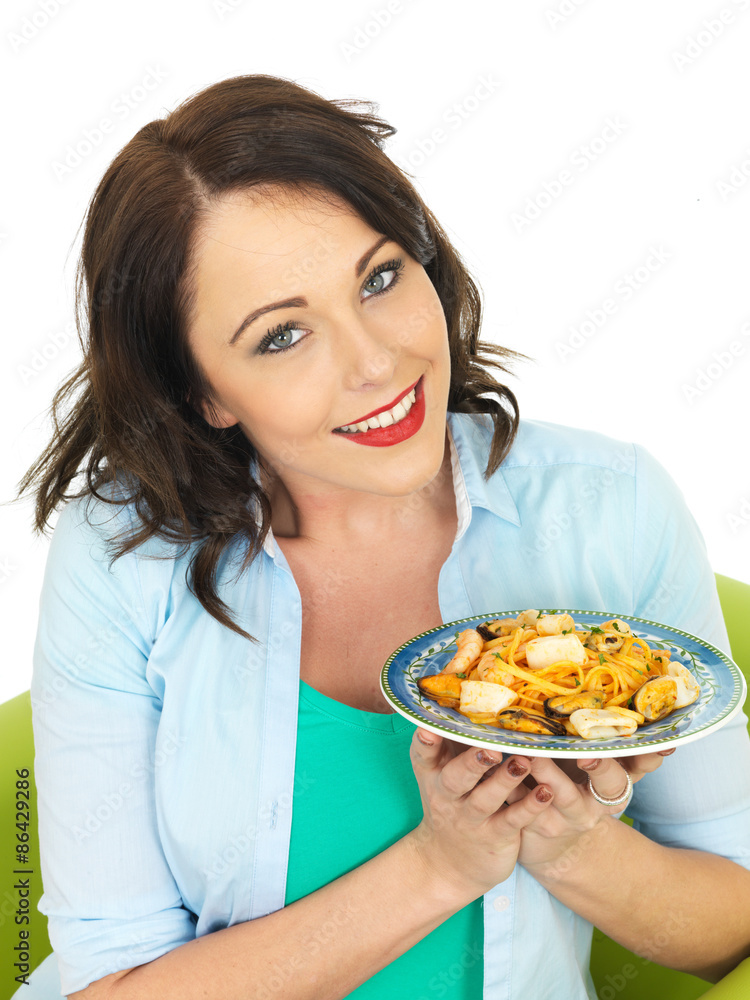 Young Woman In Her Twenties Holding a Plate of Seafood Pasta