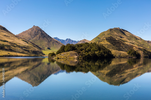 Mountain Reflected in Lake on Calm Day
