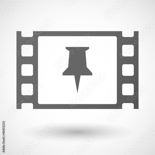 35mm film frame with a push pin