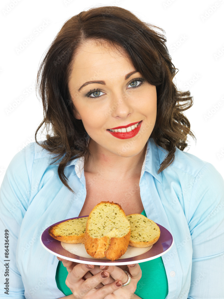Pretty Young Woman in Her Twenties Eating A Slice of Garlic Bread Pretty Young Woman in Her Twenties Eating A Slice of Garlic Bread