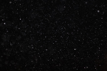 Abstract black white snow texture on black background for overlay