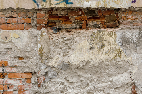 Old red brick wall background © Olga Kovalenko