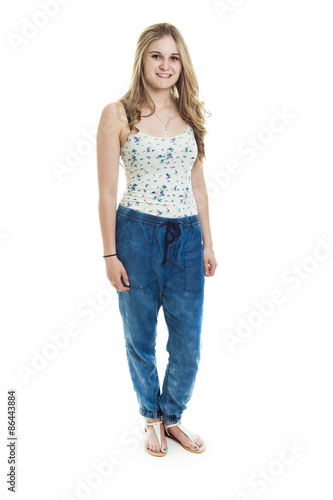 fashion look of beautiful young teen over white background © Louis-Photo