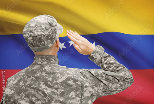 Soldier in hat facing national flag series - Venezuela