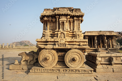 A rich carved stone chariot inside the Vittala Hindu temple in the ancient site Hampi, Karnataka, India