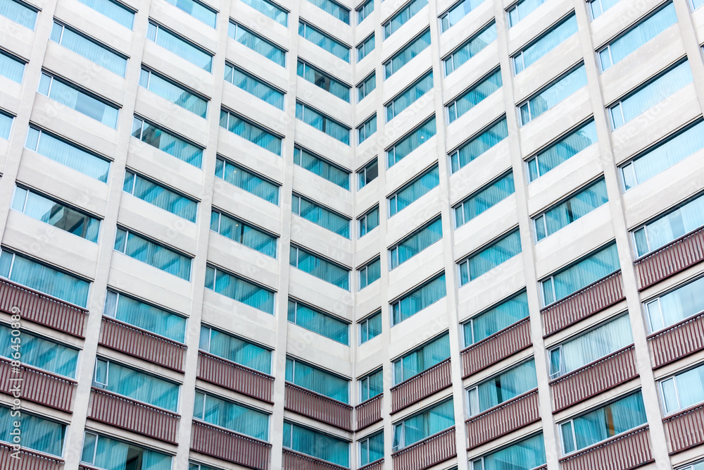 Multiple windows on a large office building