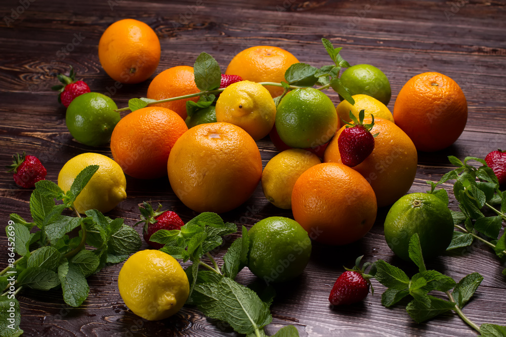 Different fruits, strawberries and fresh mint. Different fruits, strawberries and fresh mint.