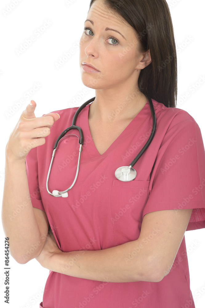 Portrait Of A Beautiful Young Female Doctor Pointing And Looking Concerned Portrait Of A Beautiful Young Female Doctor Pointing And Looking Concerned