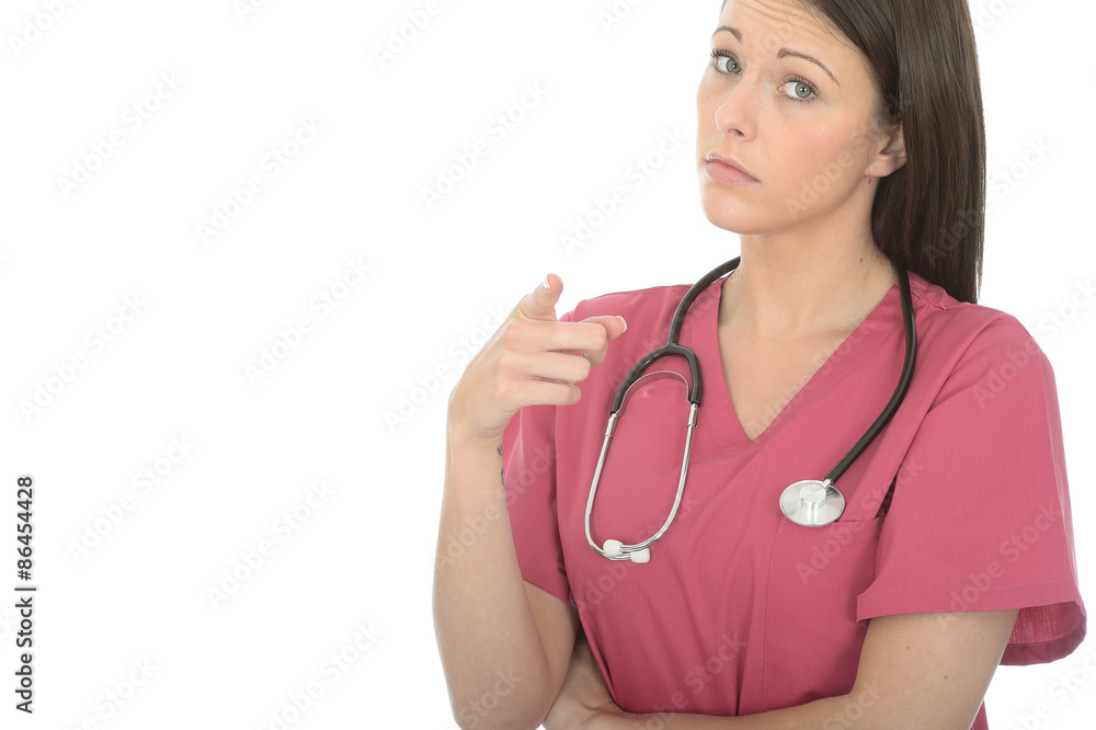 Portrait Of A Beautiful Young Female Doctor Pointing And Looking Concerned Portrait Of A Beautiful Young Female Doctor Pointing And Looking Concerned
