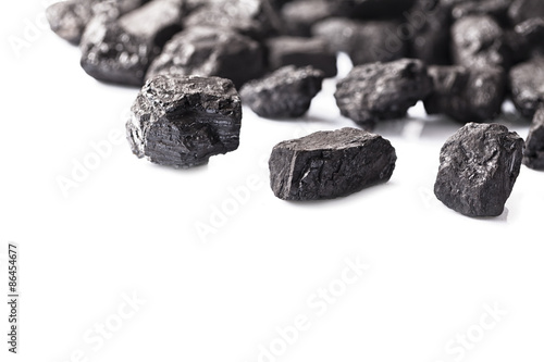 Tela Pile of coal isolated on white background