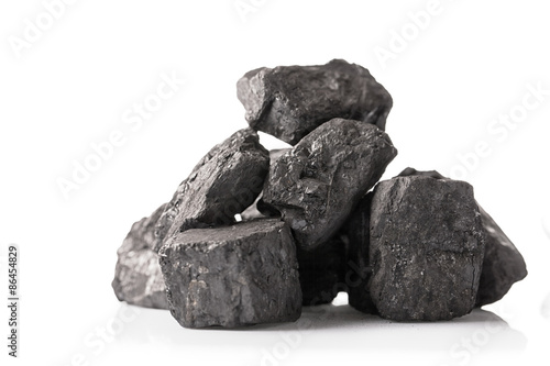 Fényképezés Pile of coal isolated on white background