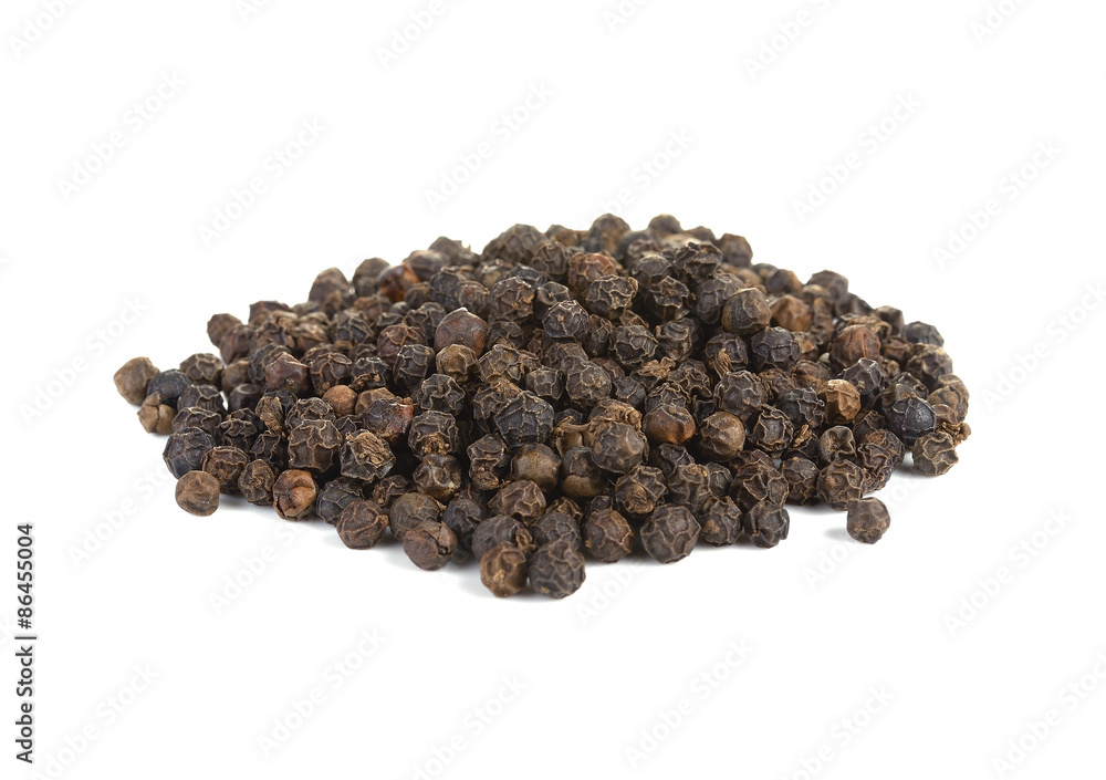 Whole black pepper, isolated on white. Shallow depth of field, f Whole black pepper, isolated on white. Shallow depth of field, f