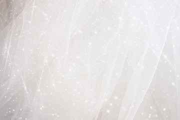Vintage tulle chiffon texture background with glitter overlay

