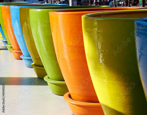 Big pot in a several bright color. photo