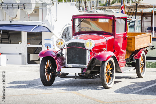 Classic vintage car at port. © daviles
