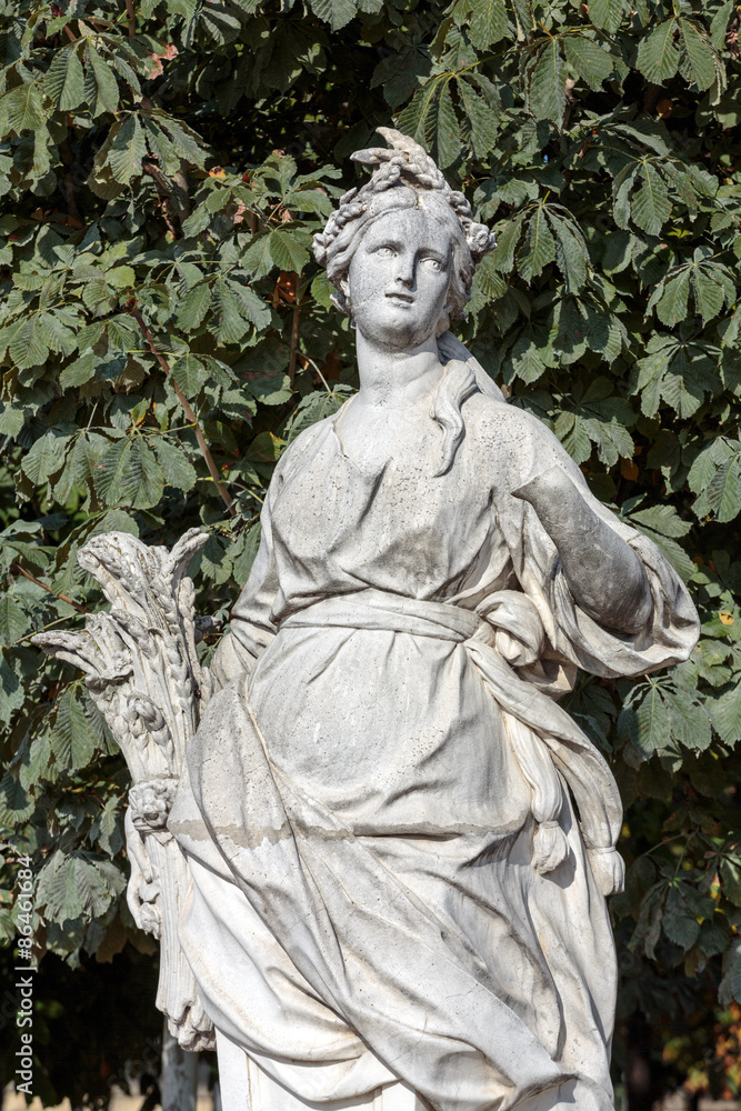 Antique sculpture in Jardin des Tuileries (Tuileries garden) - favorite spot for rest of tourists and Parisians. Garden was created by Catherine de Medici in 1564. Paris, Franc
