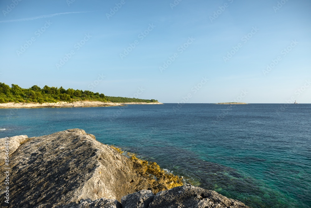 Coastline with horizon and sky