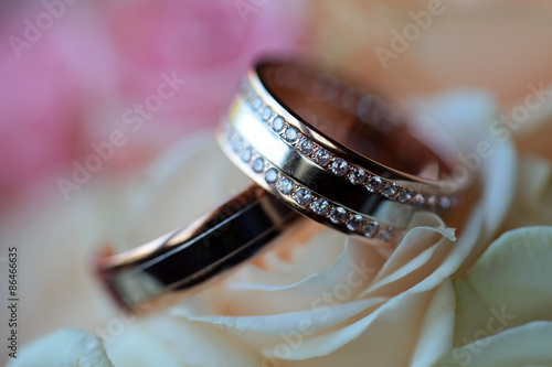 Pair of wedding rings with flowers