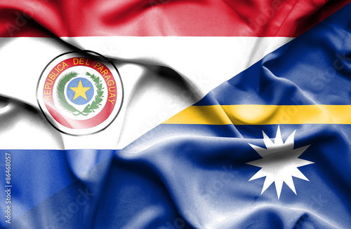 Waving flag of Nauru and Paraguay