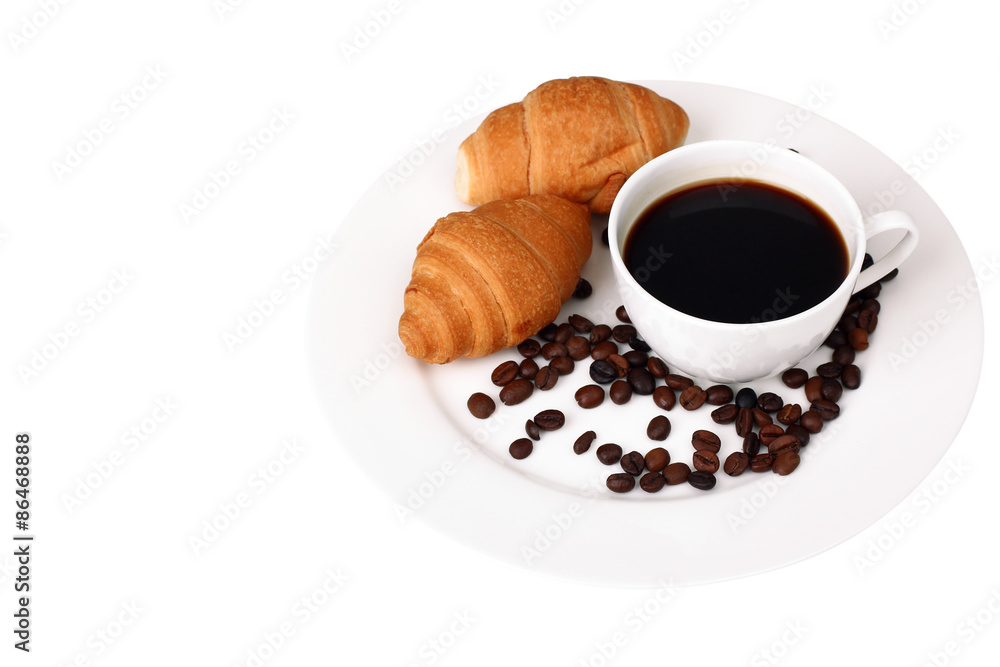 Delicious croissants on a plate with coffee isolated Delicious croissants on a plate with coffee isolated