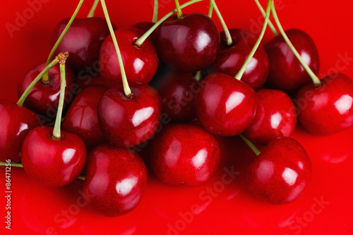 Cherry on a Red Dish