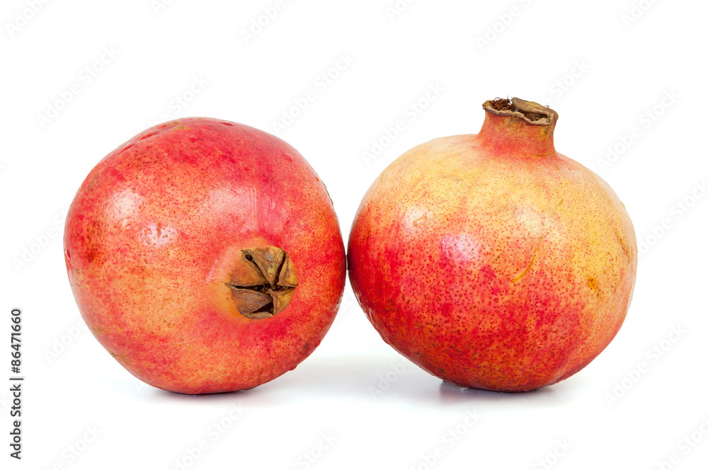 Fresh pomegranate fruits on white background Fresh pomegranate fruits on white background