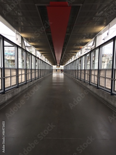 labd bridge offers stmmetrical hallway to midern transportation  photo