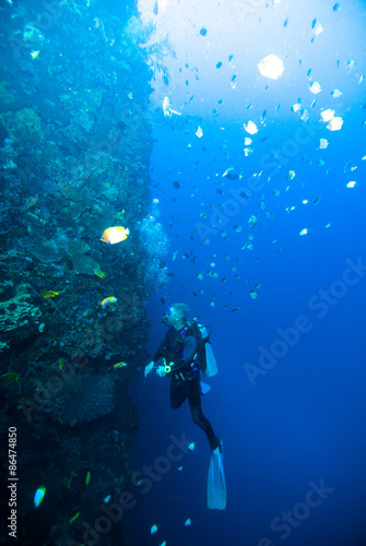 diver blue water scuba diving bunaken indonesia sea reef ocean © fenkieandreas