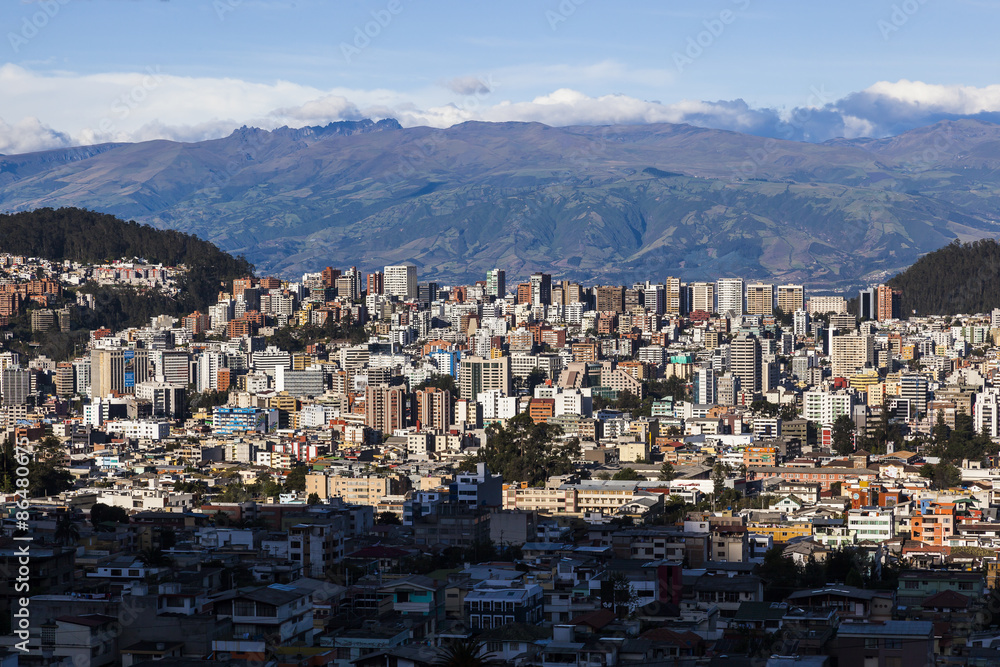 Residential and commercial modern Quito at sunset