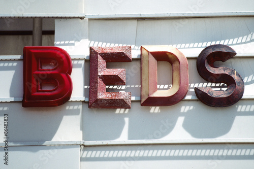 Photography "BEDS" dilapidated marguee letters