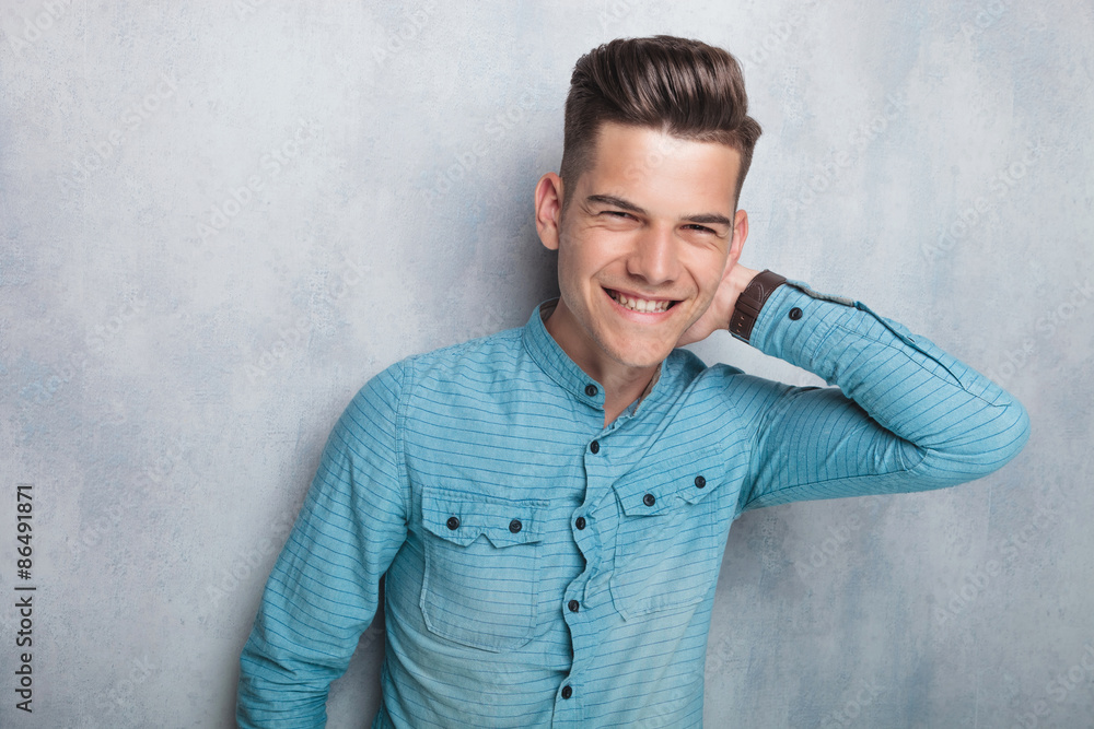 Attractive young man laughing