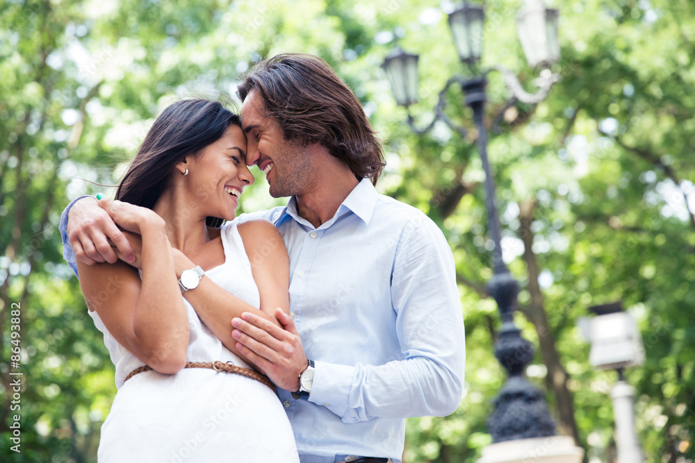 Happy beautiful couple having fun outdoors Happy beautiful couple having fun outdoors