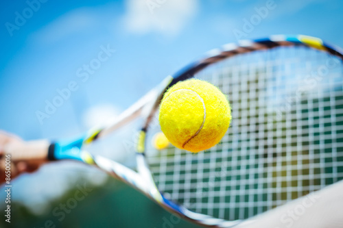 Tennis player playing a match © zorandim75